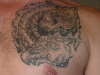 Dragon with skull tattoo