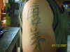 chinese gun tattoo
