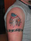 Eagle and arm band tattoo