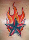 Flaming star tattoo