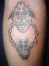 door knocker on left forearm tattoo