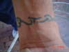 tribal wrist band tattoo