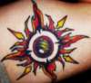 tribal sun tattoo