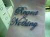 Regret Nothing tattoo