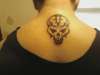 tribal skull tattoo