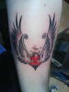 heart with wings tattoo