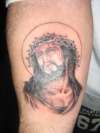 jesus on forearm tattoo