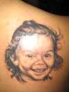 portrait on back tattoo