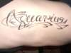 Aquarius Tat Down the Ribs. tattoo