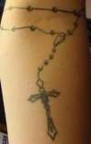 Bit blurry rosary tattoo