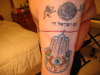 The Hand of God and the Menorah guarded by Lions tattoo