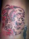 Koi on back of ribs tattoo