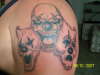 The masks of a Clown tattoo
