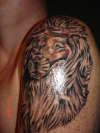 Lion With crown of thorns tattoo