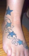 stars on foot tattoo