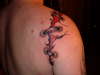 Arm ripped off tattoo