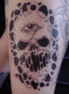 skin skull by squid tattoo