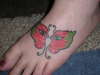 Butterfly with eyes tattoo