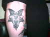 demon on calf tattoo