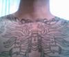 chest piece tattoo