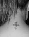 *cross on the back of my neck* tattoo
