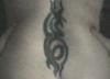 spine piece tattoo