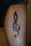 Treble clef tattoo