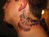 neck skull tattoo