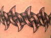 armband on right hand tattoo