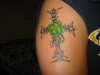 Tribal cross with shamrock tattoo