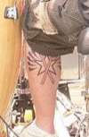 drumsticks with star and shadows tattoo