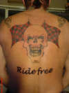 Skull on the back tattoo