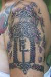 Left arm tattoo