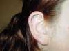 Stars in ear tattoo