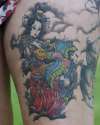 left thigh tattoo