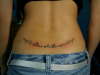 lower back tatz tattoo