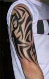 tribal 1/2 sleeve tattoo