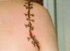 cut off arm tattoo