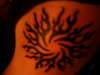 Tribal Sun tattoo