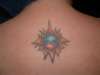 bursting sun tattoo