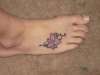 Flower foot tattoo