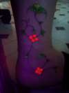 UV flowers tattoo