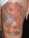 koi on thigh tattoo