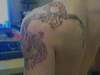 Dragon on shoulder tattoo