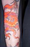 Orange Dragon tattoo