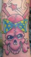 pink skull tattoo