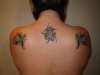 wifes birds and tribal sun tattoo