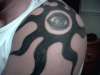 TRIBAL SUN WITH EVIL EYE tattoo