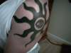 TRIBAL SUN WITH EYE tattoo