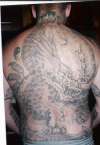 Dragon around sword tattoo